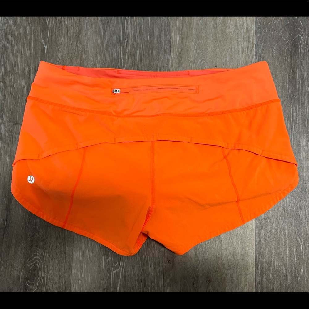 Highlight orange lululemon speed ups